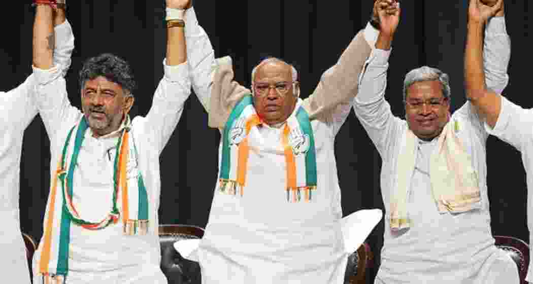 Karnataka Deputy Chief Minister D.K. Shivakumar, Congress president Mallikarjun Kharge, and Chief Minister Siddaramaiah at a party meeting in Bengaluru. Karnataka Deputy Chief Minister D.K. Shivakumar, Congress president Mallikarjun Kharge, and Chief Minister Siddaramaiah at a party meeting in Bengaluru.