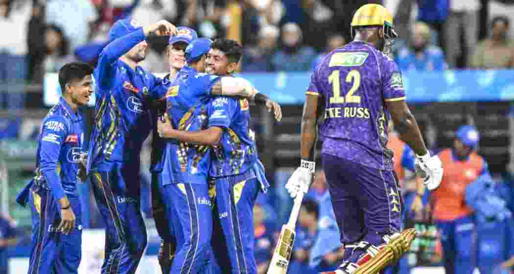 Mumbai Indians' Ashwani Kumar (L) celebrates after taking a wicket Mumbai Indians' Ashwani Kumar (L) celebrates after taking a wicket