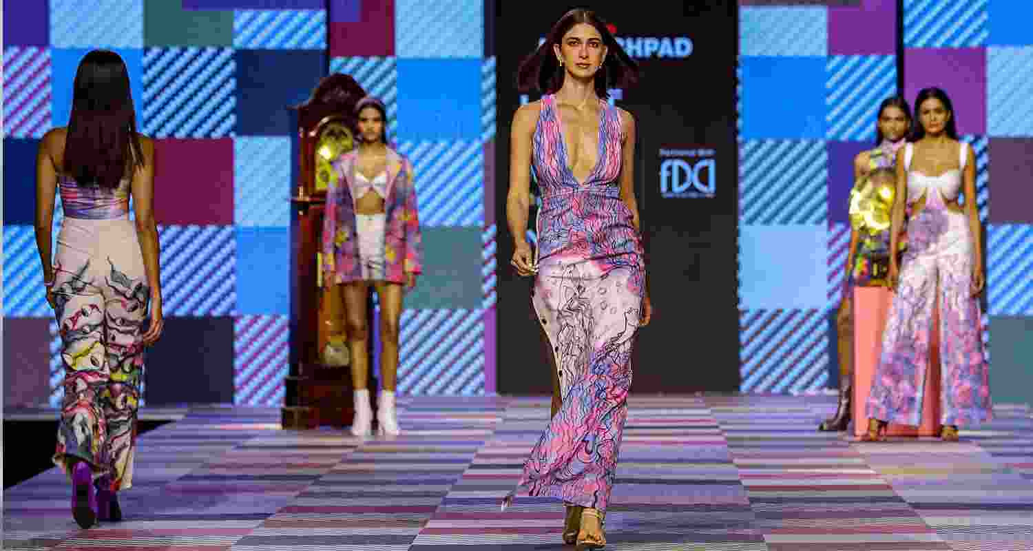 Models walk the ramp presenting the creations of the students of Inter National Institute of Fashion Design (INIFD) during the Fashion Design Council of India (FDCI) X Lakme Fashion Week (LFW), in Mumbai. Models walk the ramp presenting the creations of the students of Inter National Institute of Fashion Design (INIFD) during the Fashion Design Council of India (FDCI) X Lakme Fashion Week (LFW), in Mumbai.