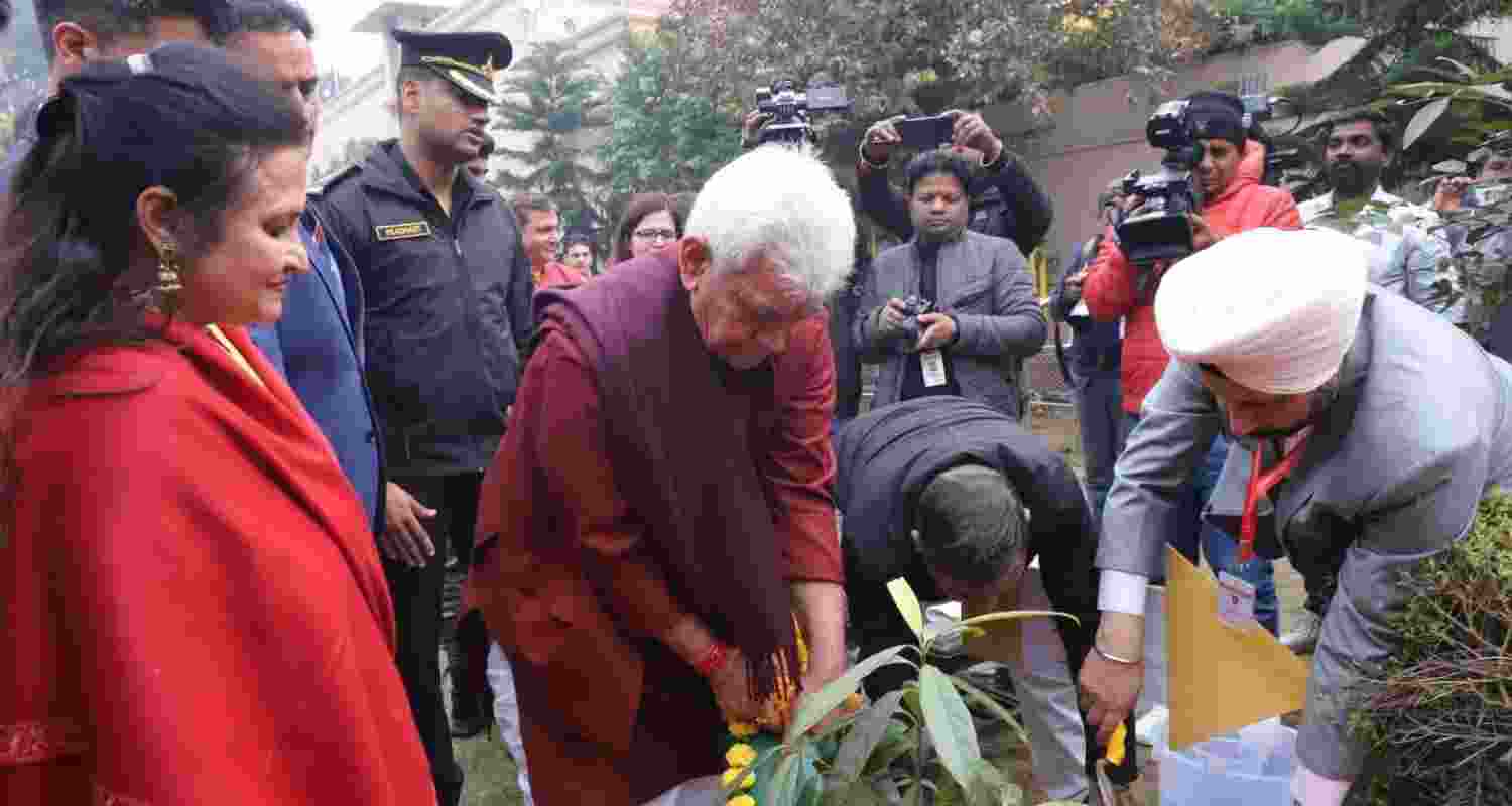 Jammu and Kashmir LG Manoj Sinha planting a ceremonial sapling at the JK House in New Delhi at the JK Sambhaav Diwas Jammu and Kashmir LG Manoj Sinha planting a ceremonial sapling at the JK House in New Delhi at the JK Sambhaav Diwas