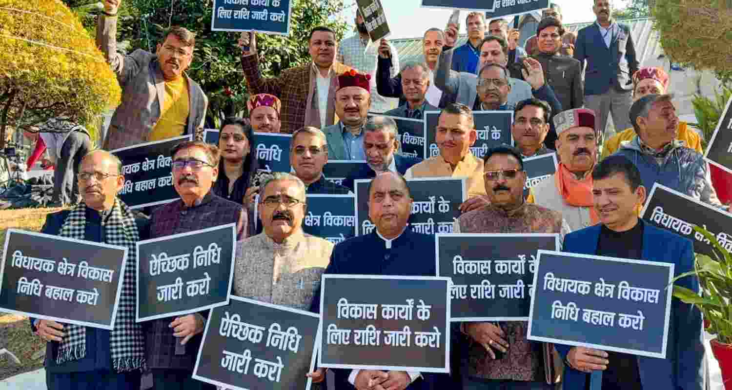 LoP Jai Ram Thakur and other leaders stage a protest during the Winter Session of the state Assembly, in Dharamshala. LoP Jai Ram Thakur and other leaders stage a protest during the Winter Session of the state Assembly, in Dharamshala.
