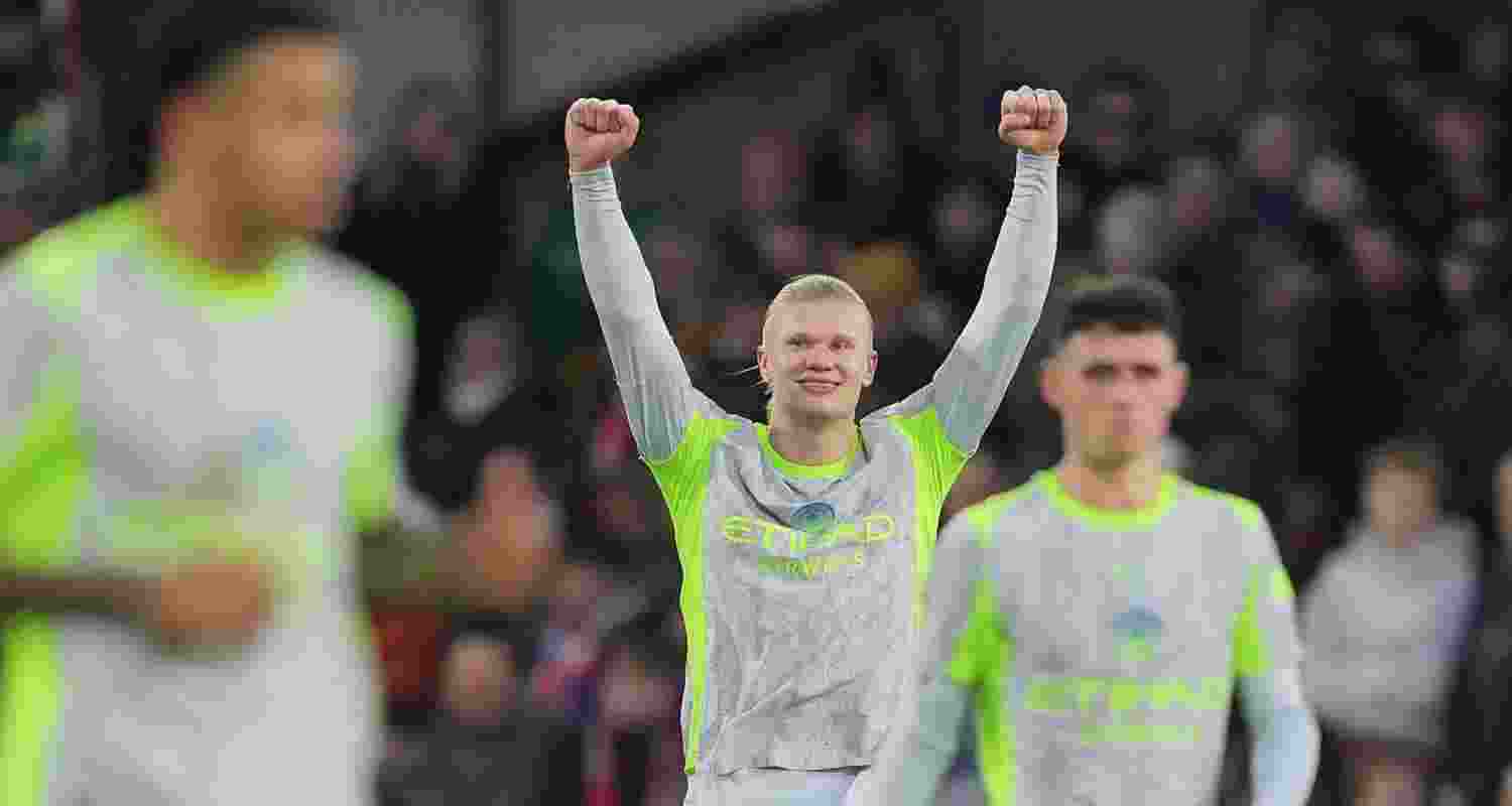 Manchester City's Erling Haaland celebrates after scoring his side's third goal during the EPL soccer match between Crystal Palace and Manchester City in London. Manchester City's Erling Haaland celebrates after scoring his side's third goal during the EPL soccer match between Crystal Palace and Manchester City in London.