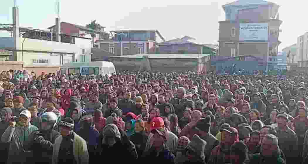 Villagers in Churachandpur staging a massive protest, demanding the release of pending MGNREGA wages before Christmas. Villagers in Churachandpur staging a massive protest, demanding the release of pending MGNREGA wages before Christmas.