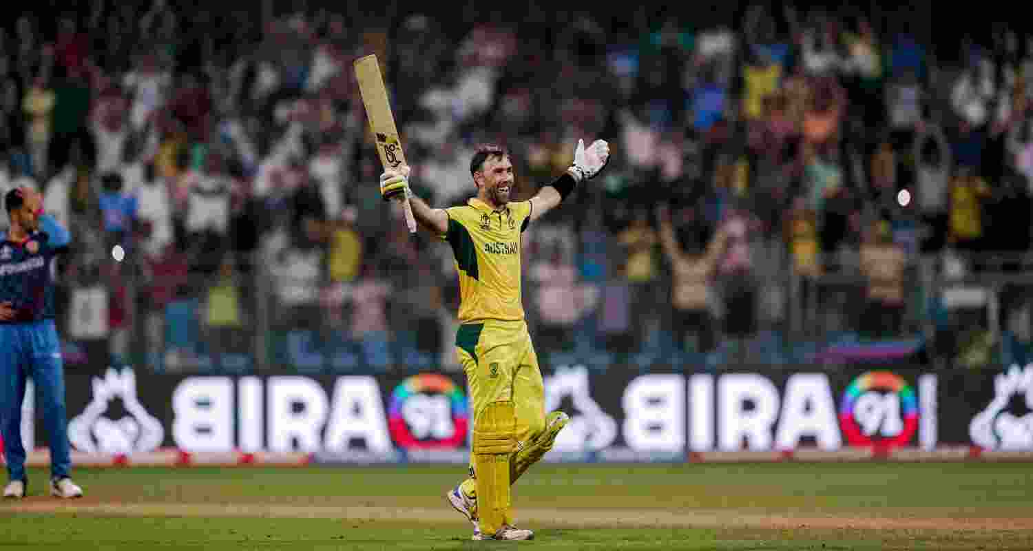 Australian batsman Glenn Maxwell wearing the australian yellow jersey celebrates his legendary knock against Afghanistan in the ICC Cricket World Cup 2023. Australian batsman Glenn Maxwell wearing the australian yellow jersey celebrates his legendary knock against Afghanistan in the ICC Cricket World Cup 2023.