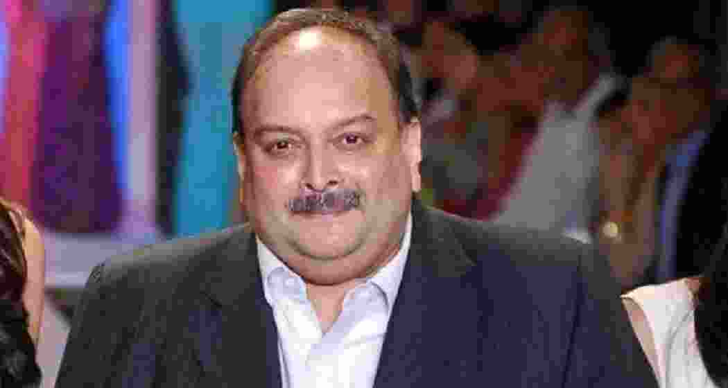 Choksi and his nephew Nirav Modi are wanted by the ED and CBI for allegedly defrauding Punjab National Bank of ₹13,400 crore with bank officials' complicity. Choksi and his nephew Nirav Modi are wanted by the ED and CBI for allegedly defrauding Punjab National Bank of ₹13,400 crore with bank officials' complicity.