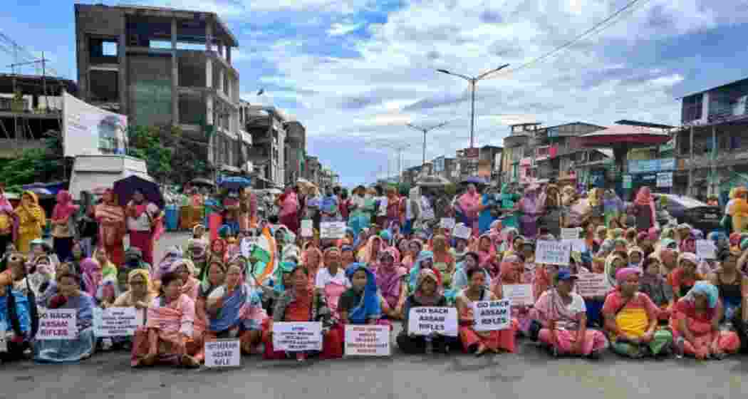 Meitei women block a road in Imphal during a protest against the Assam Rifles in August last year. Meitei women block a road in Imphal during a protest against the Assam Rifles in August last year.