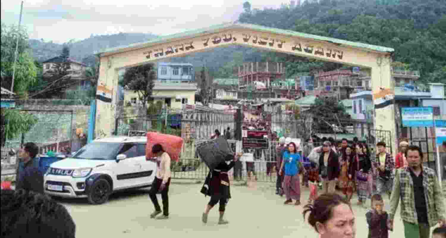 People gather at the Mizoram-Myanmar border gate. People gather at the Mizoram-Myanmar border gate.