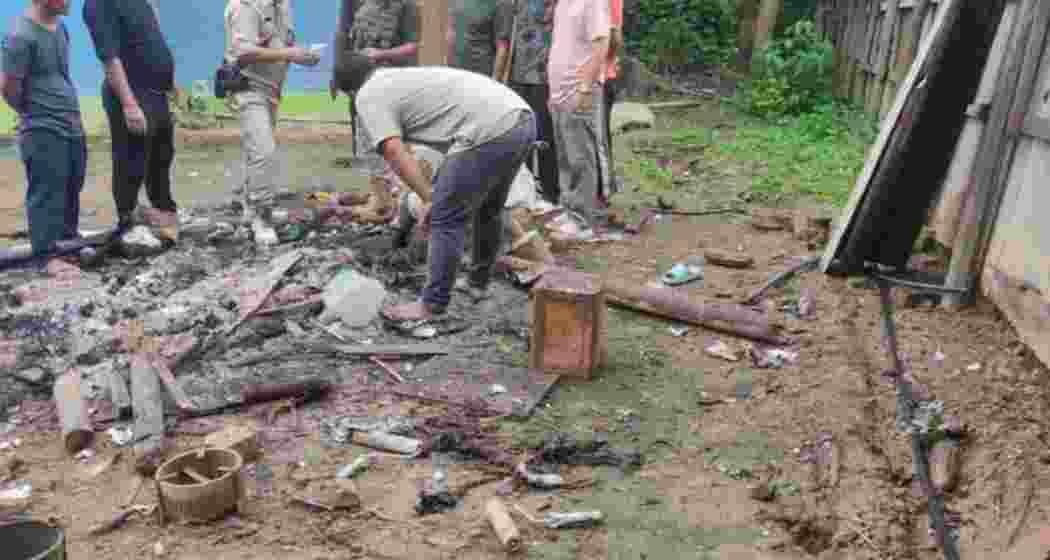The site where the bomb detonated at former MLA Yamthong Haokip’s residence in Kangpokpi, leaving behind debris and marking the tragic spot that claimed his wife’s life. The site where the bomb detonated at former MLA Yamthong Haokip’s residence in Kangpokpi, leaving behind debris and marking the tragic spot that claimed his wife’s life.