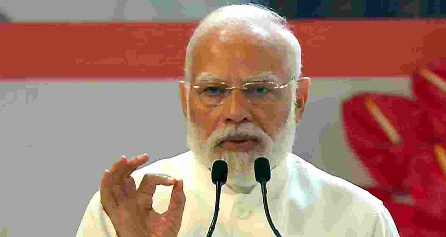 PM Modi greets the gathering during an event marking 150 years of the national song Vande Mataram at the Indira Gandhi Indoor Stadium. PM Modi greets the gathering during an event marking 150 years of the national song Vande Mataram at the Indira Gandhi Indoor Stadium.