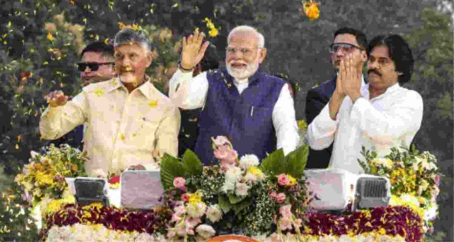 Prime Minister Narendra Modi (centre) with Chief Minister N Chandrababu Naidu (left) and Deputy CM Pawan Kalyan during a roadshow in Andhra Pradesh - file image.   Prime Minister Narendra Modi (centre) with Chief Minister N Chandrababu Naidu (left) and Deputy CM Pawan Kalyan during a roadshow in Andhra Pradesh - file image.