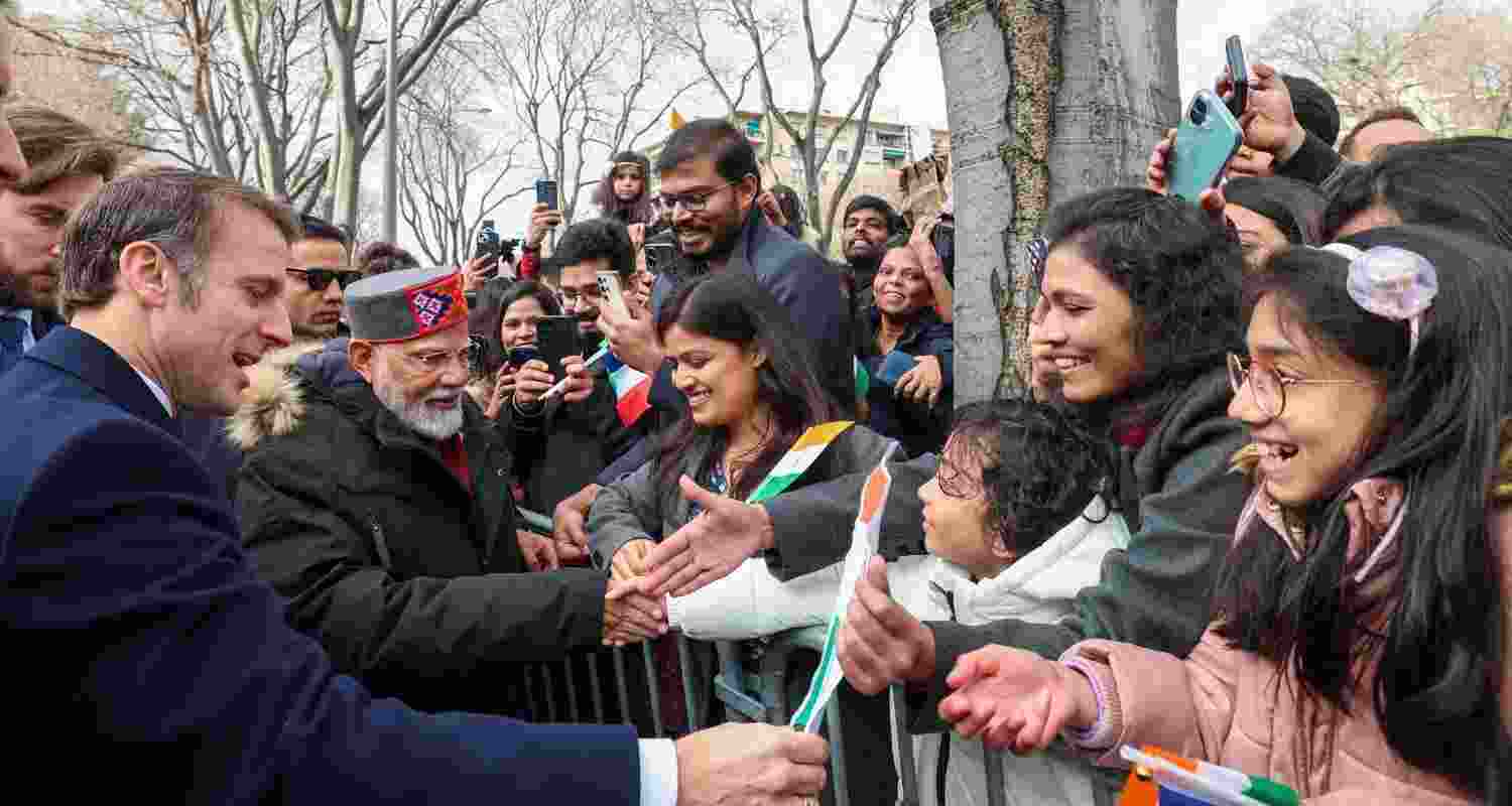 PM Modi and French President Emannuel Macron meet with Indian diaspora in Marseilles, France, Wednesday. PM Modi and French President Emannuel Macron meet with Indian diaspora in Marseilles, France, Wednesday.