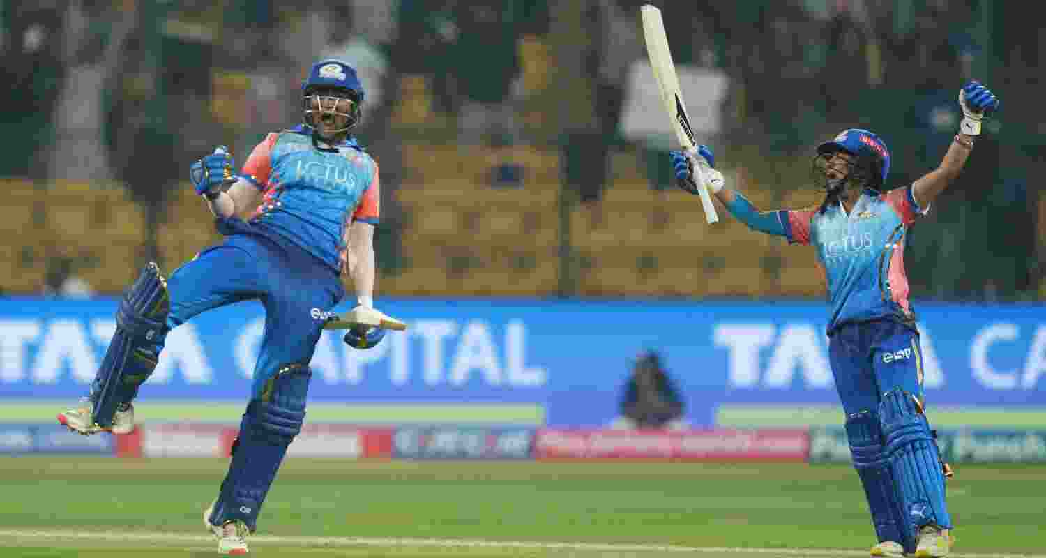 Mumbai Indian batswomen Yasika Bhatia celebrates with skipper Harmanpreet Kaur in Bengaluru Mumbai Indian batswomen Yasika Bhatia celebrates with skipper Harmanpreet Kaur in Bengaluru