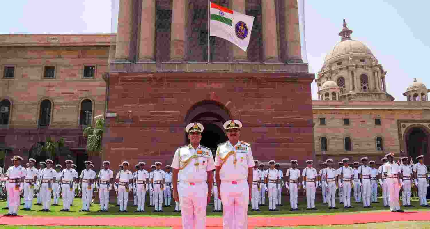 Admiral Dinesh Kumar Tripathi with outgoing Navy Chief Adm R. Hari Kumar.  Admiral Dinesh Kumar Tripathi with outgoing Navy Chief Adm R. Hari Kumar.