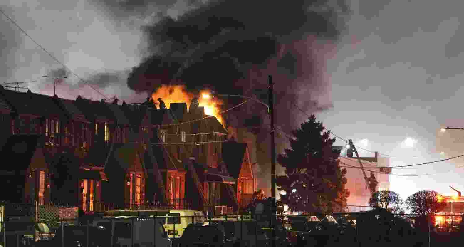 Smoke and flames rise from the site where the plane crashed. Image via X. Smoke and flames rise from the site where the plane crashed. Image via X.