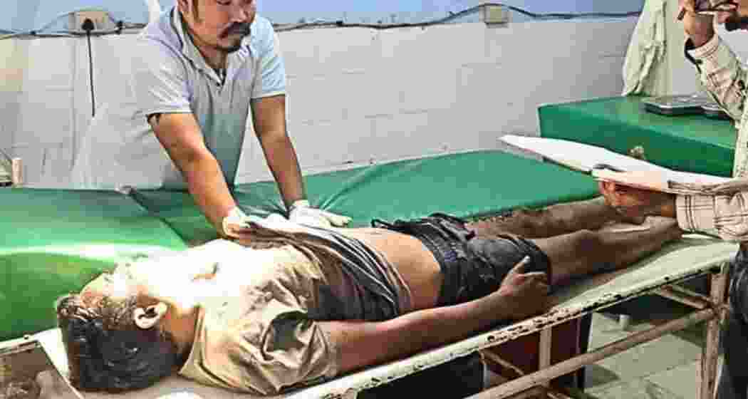 The body of the suspected Maoist being scrutinized after the Kokrajhar encounter. The body of the suspected Maoist being scrutinized after the Kokrajhar encounter.
