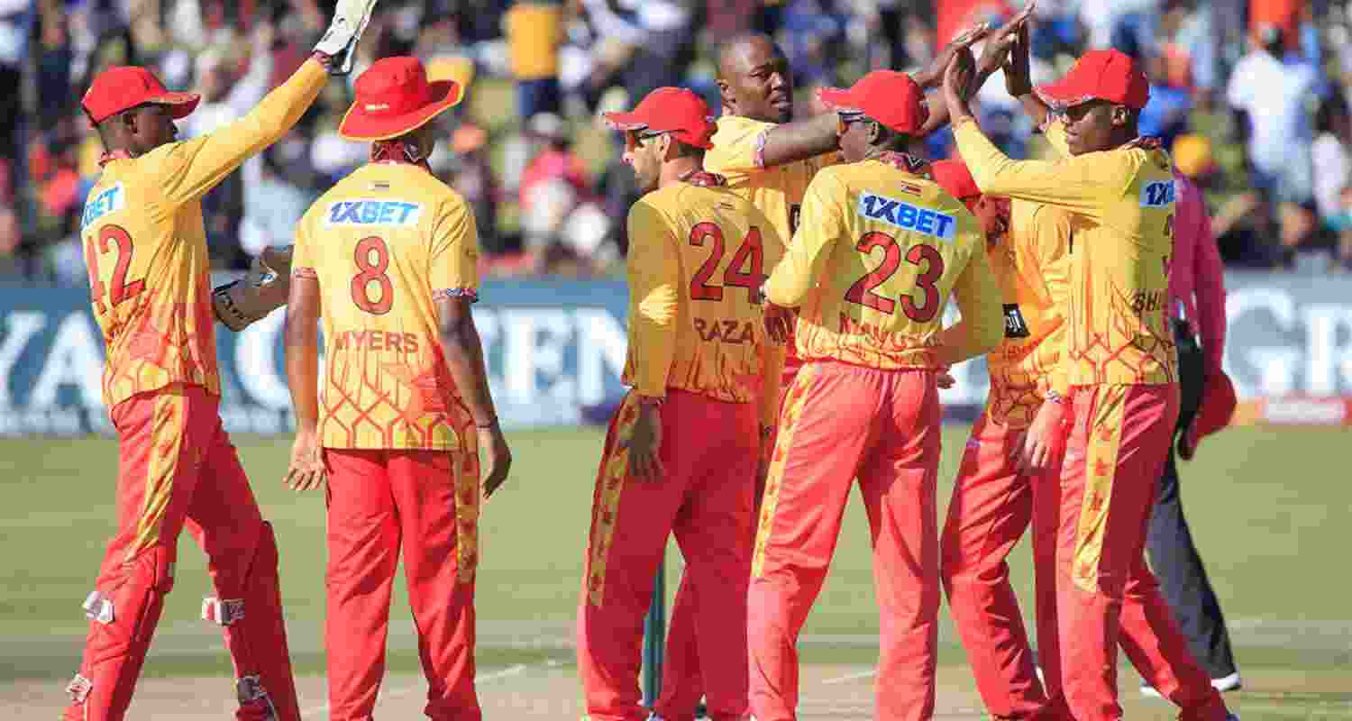 Team Zimbabwe celebrate their victory in the first T20I against India. Team Zimbabwe celebrate their victory in the first T20I against India.
