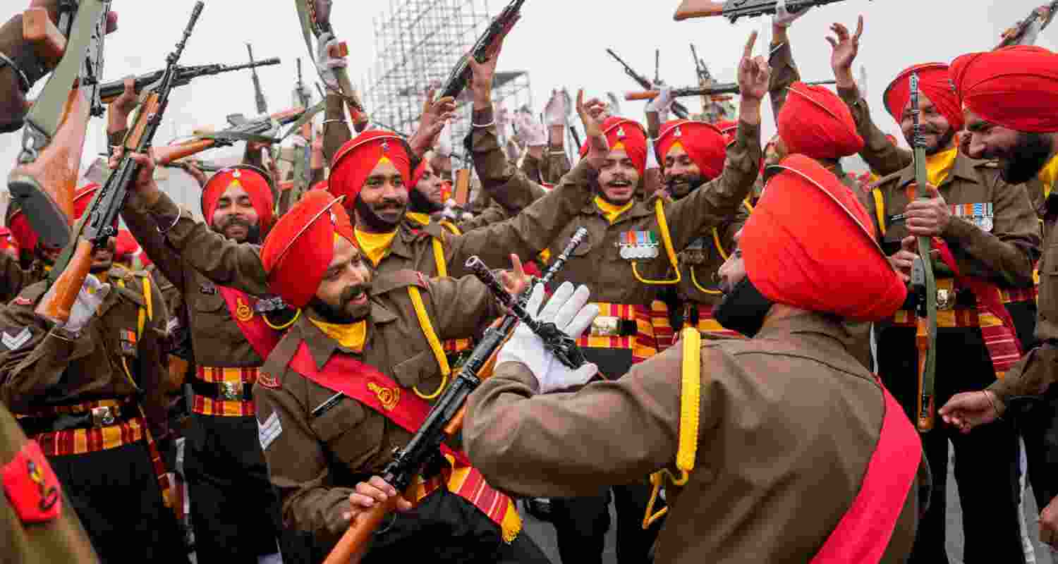 Dance of the Warriors: A celebratory sight as the Indian Army's Sikh Regiment personnel are clicked during a full dress rehearsal ahead of the Republic Day Parade 2024. The Sikh regiment was founded in the year 1846 and holds the distinction of being the highest decorated regiment in the Indian Army. Dance of the Warriors: A celebratory sight as the Indian Army's Sikh Regiment personnel are clicked during a full dress rehearsal ahead of the Republic Day Parade 2024. The Sikh regiment was founded in the year 1846 and holds the distinction of being the highest decorated regiment in the Indian Army.