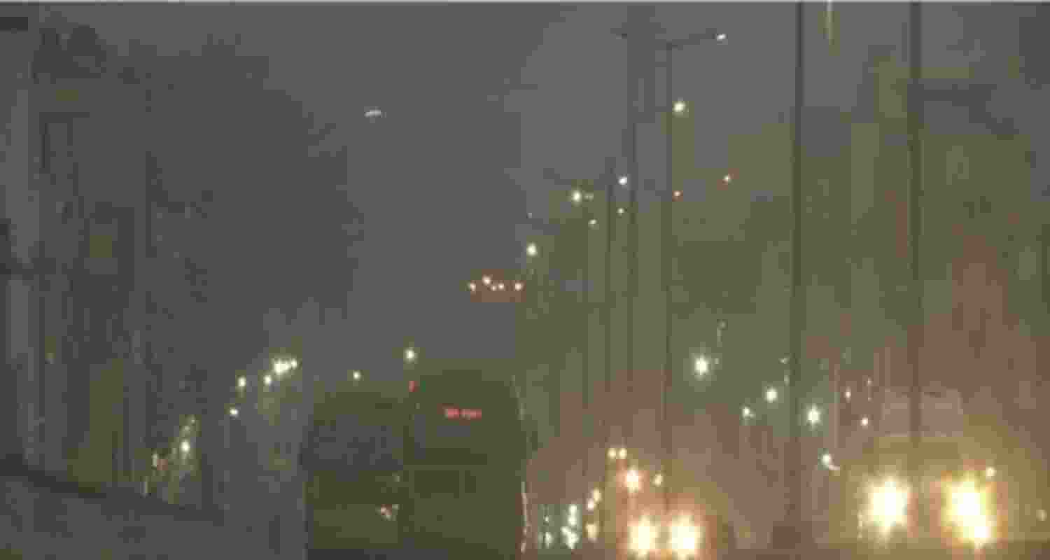 Vehicles move through fog on a cold winter morning, in New Delhi. Vehicles move through fog on a cold winter morning, in New Delhi.