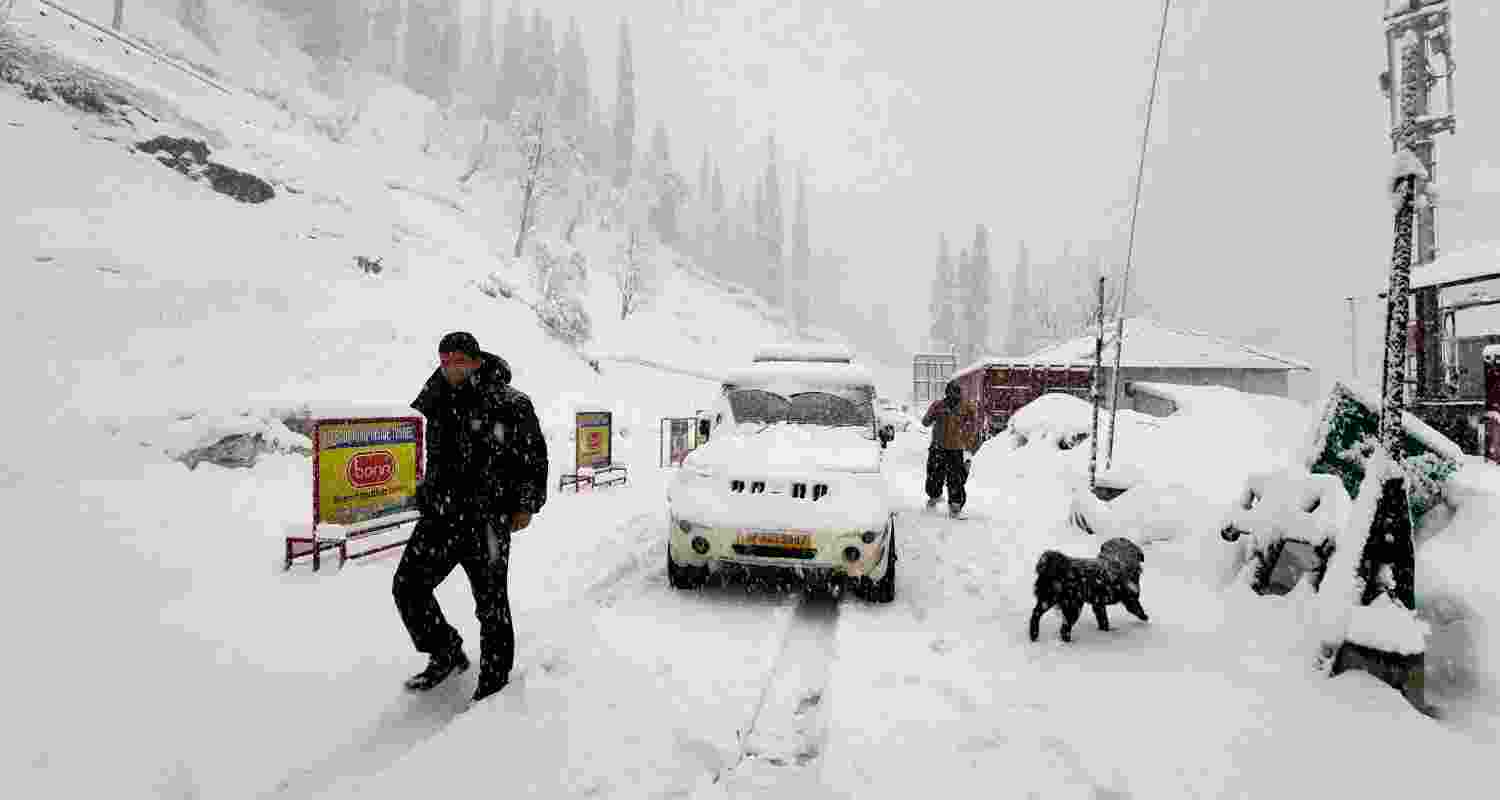 Snow-covered road at the Atal Tunnel Rohtang South Portal during snowfall.  Snow-covered road at the Atal Tunnel Rohtang South Portal during snowfall.