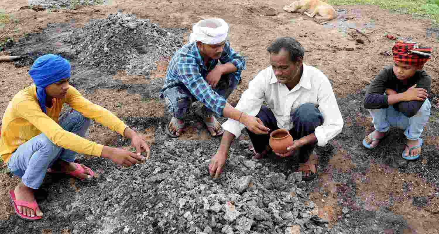 Family members performs last rites of 3 women who were killed in a stampede during a 'satsang' on Tuesday, in Hathras, Thursday, July 4, 2024.   Family members performs last rites of 3 women who were killed in a stampede during a 'satsang' on Tuesday, in Hathras, Thursday, July 4, 2024.