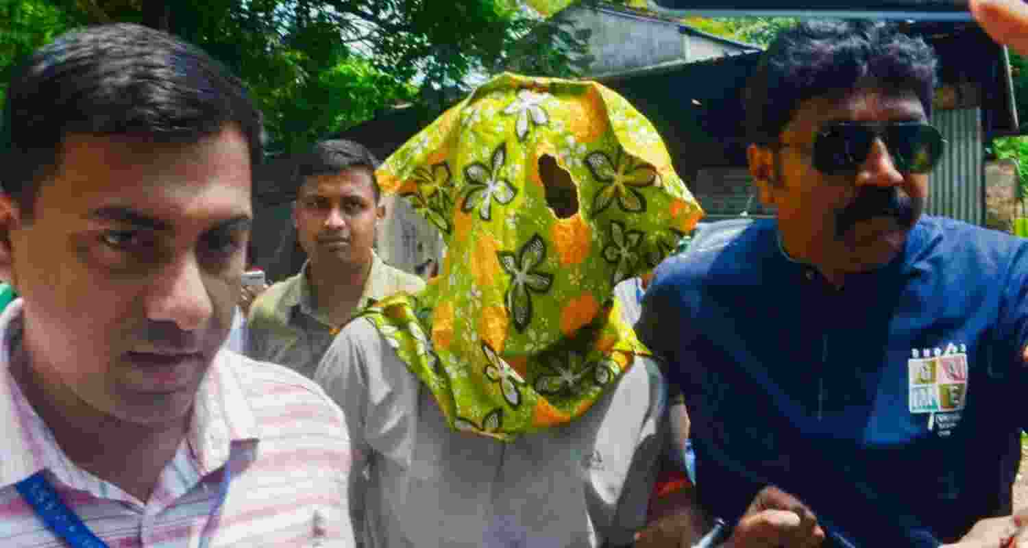 An accused who was arrested in connection with the murder of Bangladeshi MP Anwarul Azim Anar being produced at a local court, at Barasat in North 24 Parganas district on Friday, May 24, 2024 An accused who was arrested in connection with the murder of Bangladeshi MP Anwarul Azim Anar being produced at a local court, at Barasat in North 24 Parganas district on Friday, May 24, 2024