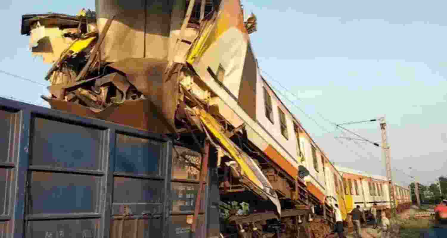 People gather after a passenger train collided with a goods train near Bilaspur railway station, Chhattisgarh, Tuesday. People gather after a passenger train collided with a goods train near Bilaspur railway station, Chhattisgarh, Tuesday.