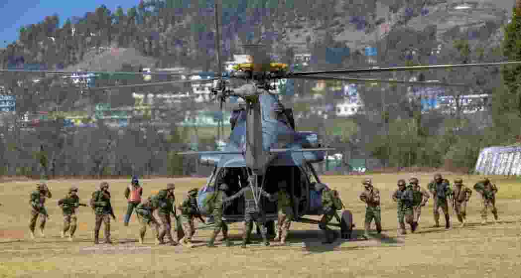 Indian Army and Indian Air Force personnel perform a task during a joint military exercise in the Eastern Sector. Indian Army and Indian Air Force personnel perform a task during a joint military exercise in the Eastern Sector.