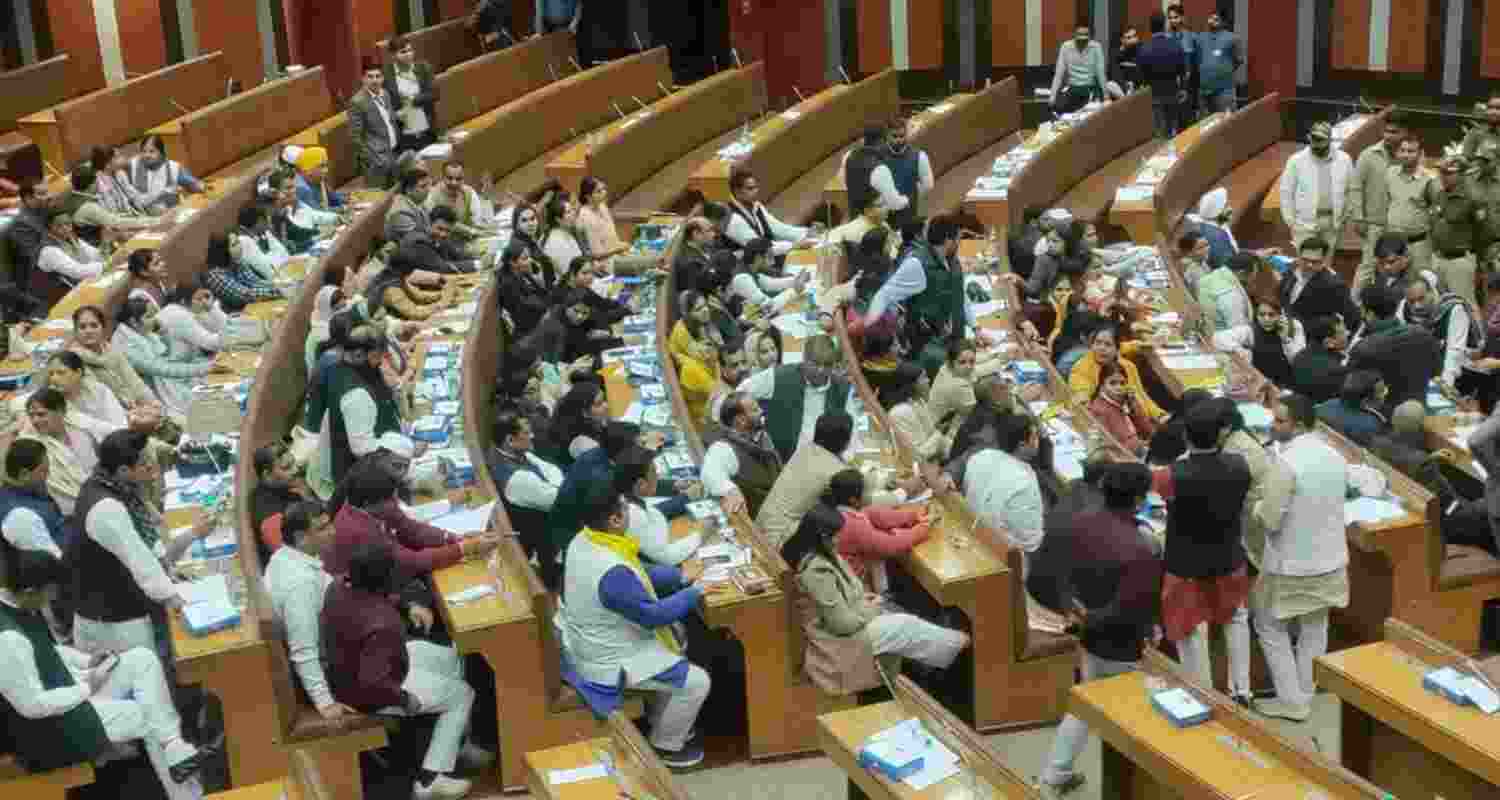 Chaos in MCD House as BJP Councillors Protest Against Arvind Kejriwal. Image X. Chaos in MCD House as BJP Councillors Protest Against Arvind Kejriwal. Image X.