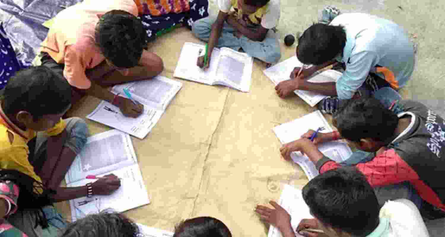 Jharkhand students posed as labourers to steal exam papers. Jharkhand students posed as labourers to steal exam papers.