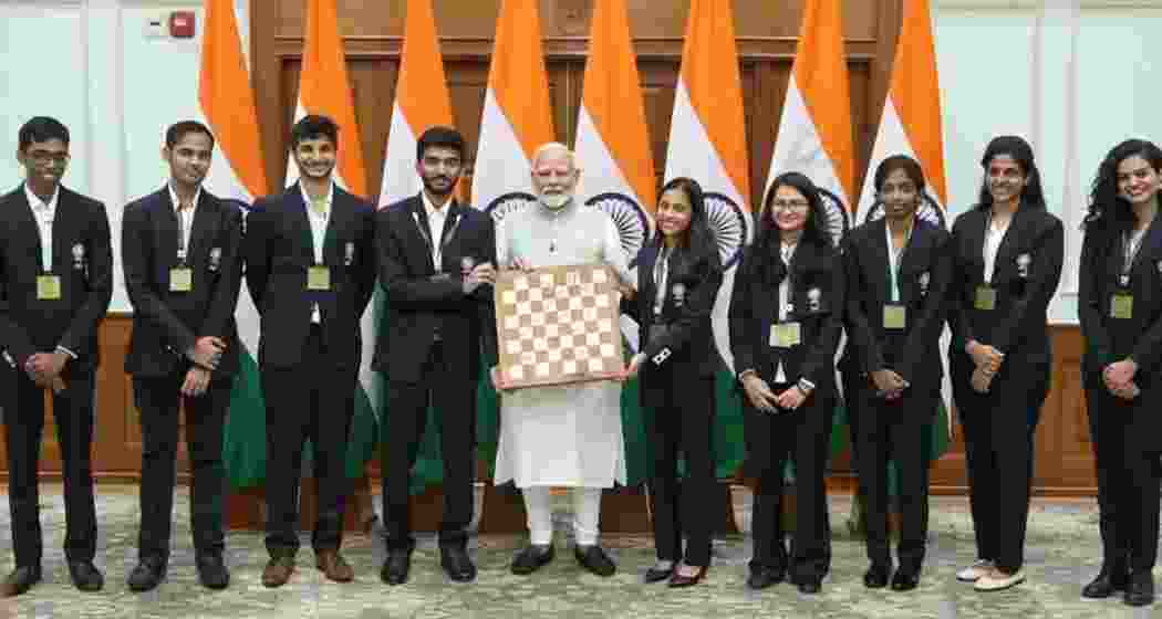 PM Modi meets India’s Chess champions. Image taken from X.  PM Modi meets India’s Chess champions. Image taken from X.