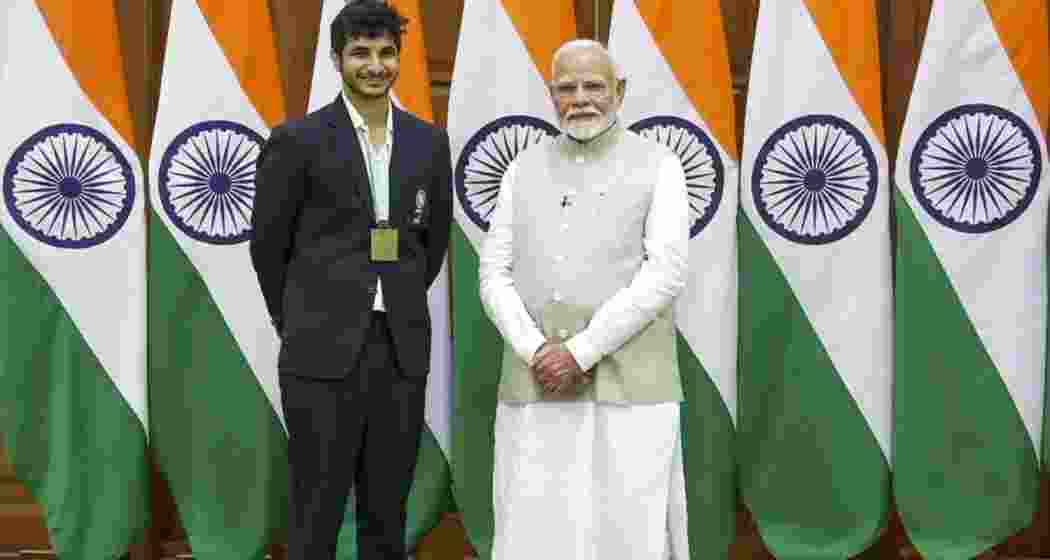 Grandmaster Vidit Gujrathi with PM Modi.  Grandmaster Vidit Gujrathi with PM Modi.