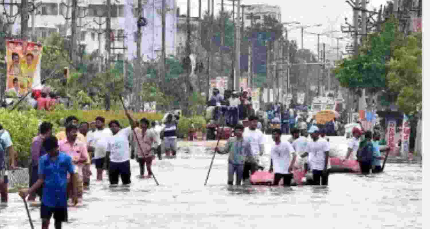 Andhra limps back to normalcy as flood water recedes Andhra limps back to normalcy as flood water recedes