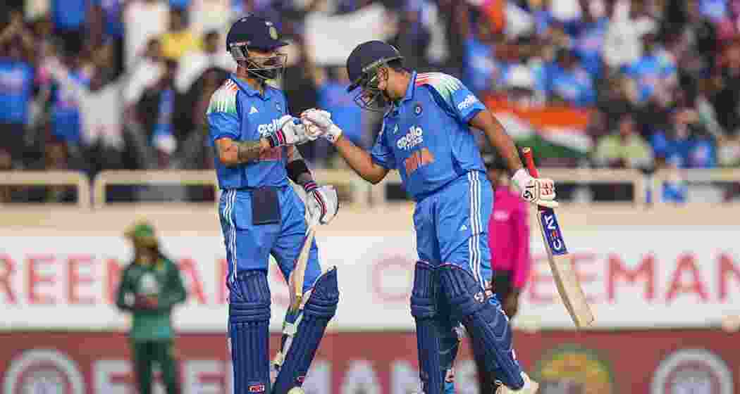 India's Virat Kohli, left, celebrates his half century with Rohit Sharma during the first ODI cricket match of a series between India and South Africa, at JSCA International Stadium Complex, in Ranchi, Jharkhand on Sunday. India's Virat Kohli, left, celebrates his half century with Rohit Sharma during the first ODI cricket match of a series between India and South Africa, at JSCA International Stadium Complex, in Ranchi, Jharkhand on Sunday.
