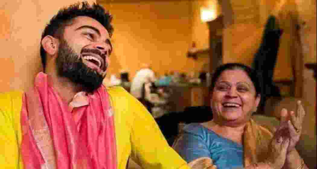 Virat Kohli with his mother.  Virat Kohli with his mother.
