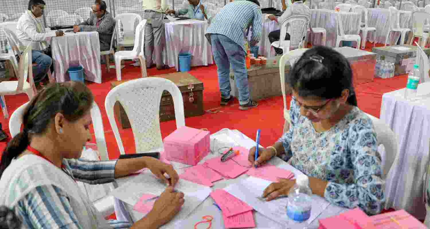 Polling officials carry out preparations at a counting centre, a day before counting of votes for the Lok Sabha elections, in Nagpur, Monday, June 3, 2024.   Polling officials carry out preparations at a counting centre, a day before counting of votes for the Lok Sabha elections, in Nagpur, Monday, June 3, 2024.