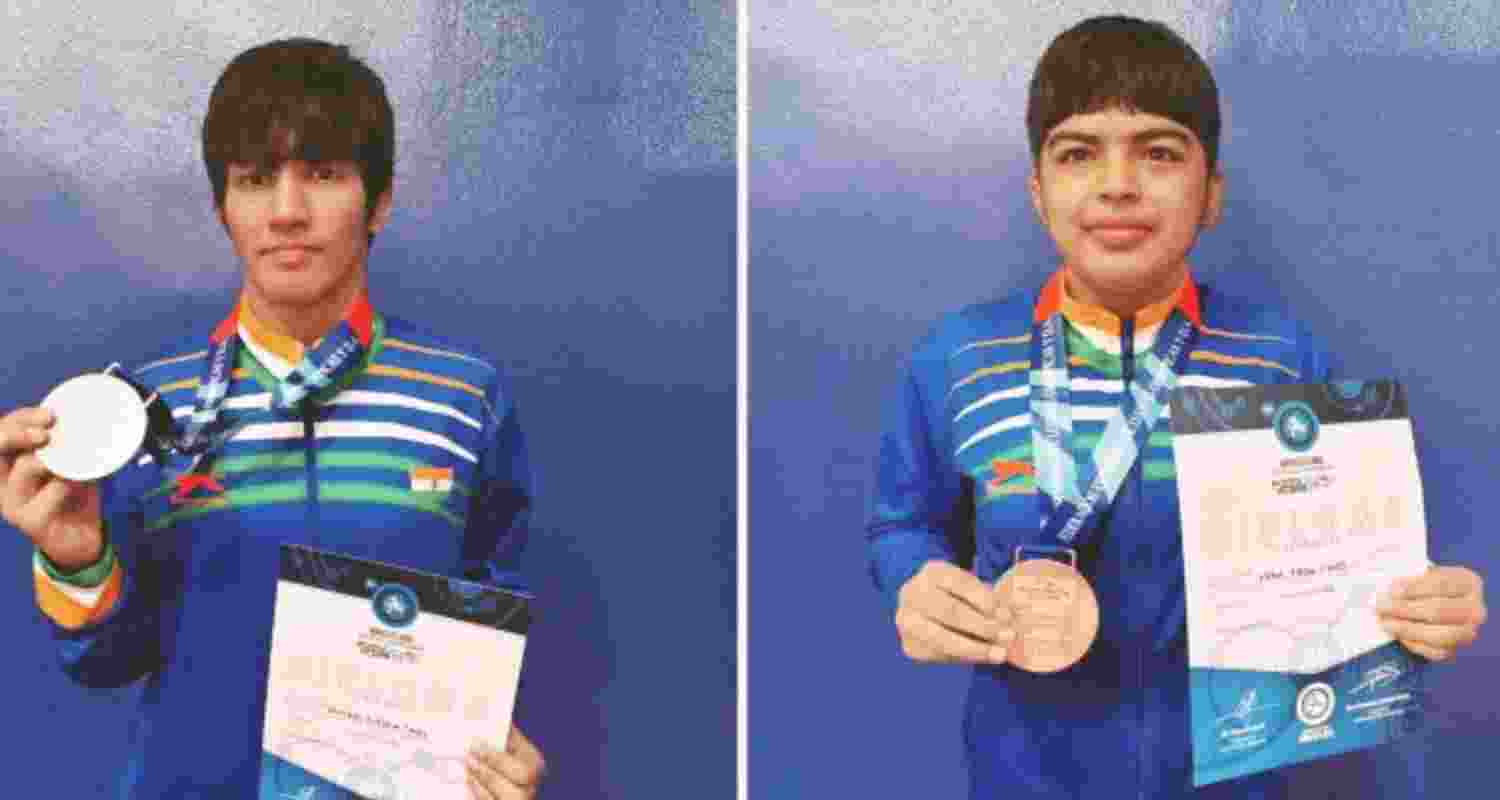 Nikita won a silver in the women’s 62 kg freestyle category, while Neha bagged a bronze medal.  Nikita won a silver in the women’s 62 kg freestyle category, while Neha bagged a bronze medal.