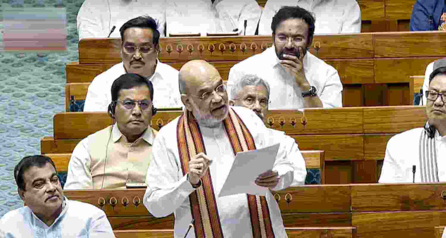 Union Home Minister Amit Shah speaks during a debate in the Lok Sabha on the Pahalgam terror attack and Operation Sindoor, at the Monsoon session of Parliament, in New Delhi, Tuesday. Union Home Minister Amit Shah speaks during a debate in the Lok Sabha on the Pahalgam terror attack and Operation Sindoor, at the Monsoon session of Parliament, in New Delhi, Tuesday.