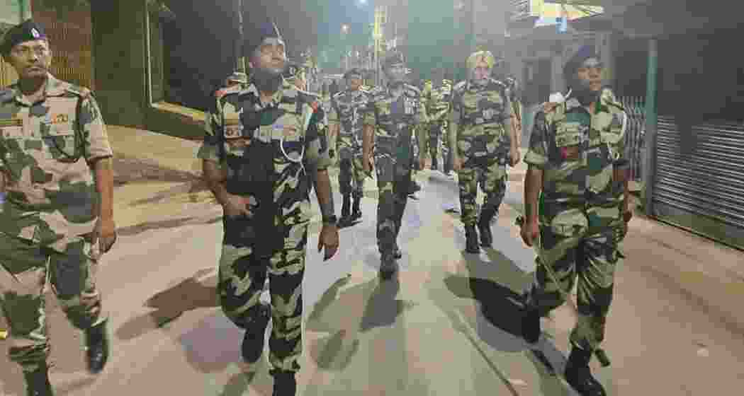 BSF personnel patrol Dhuliyan town in West Bengal's Murshidabad district following violent protests over the Waqf (Amendment) Act. BSF personnel patrol Dhuliyan town in West Bengal's Murshidabad district following violent protests over the Waqf (Amendment) Act.