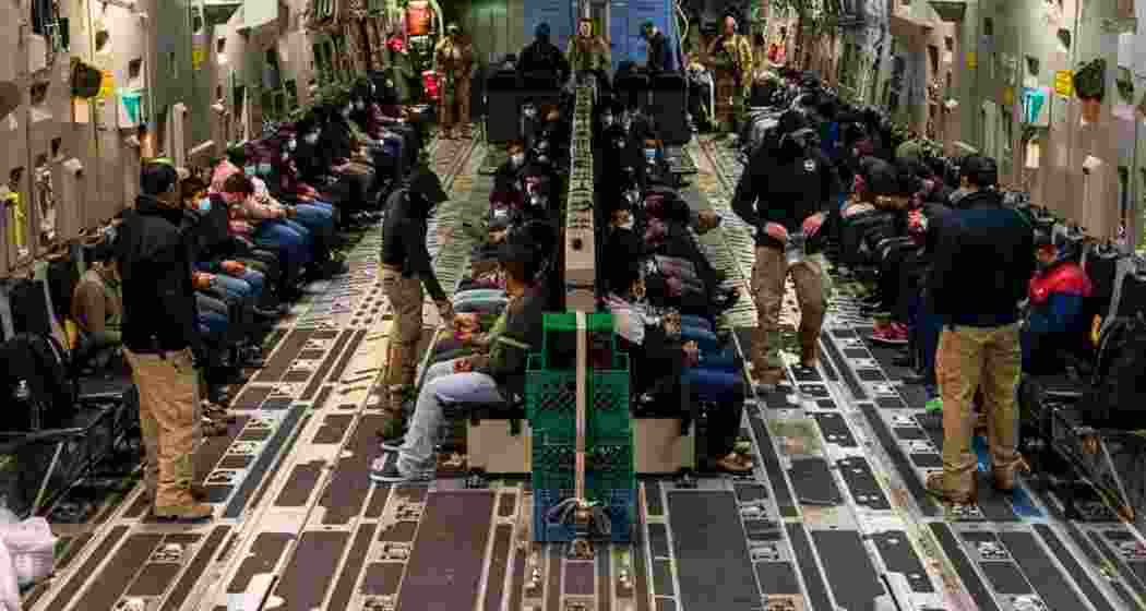 Indian deportees seated inside a US military aircraft before their arrival at Amritsar airport. File photo. Indian deportees seated inside a US military aircraft before their arrival at Amritsar airport. File photo.