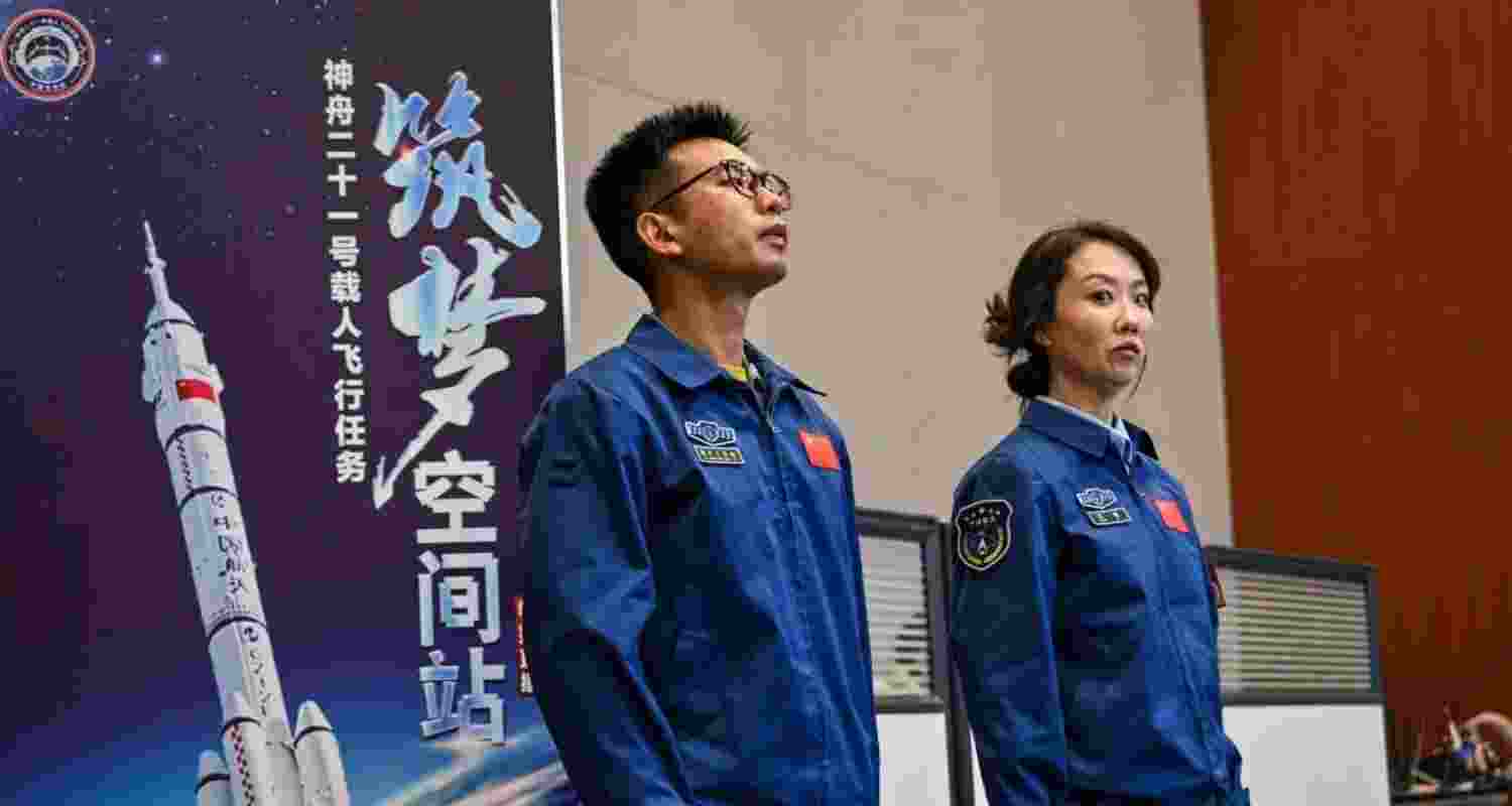 Staff members attending a press conference of the Shenzhou-21 Manned Space Mission a day before the mission's launch at the Jiuquan Satellite Launch Centre in Jiuquan on Thursday. Staff members attending a press conference of the Shenzhou-21 Manned Space Mission a day before the mission's launch at the Jiuquan Satellite Launch Centre in Jiuquan on Thursday.