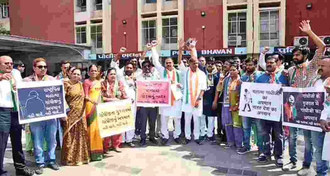 Congress leaders stage a protest against a play on Nathuram Godse in Gujarat’s Rajkot. Congress leaders stage a protest against a play on Nathuram Godse in Gujarat’s Rajkot.