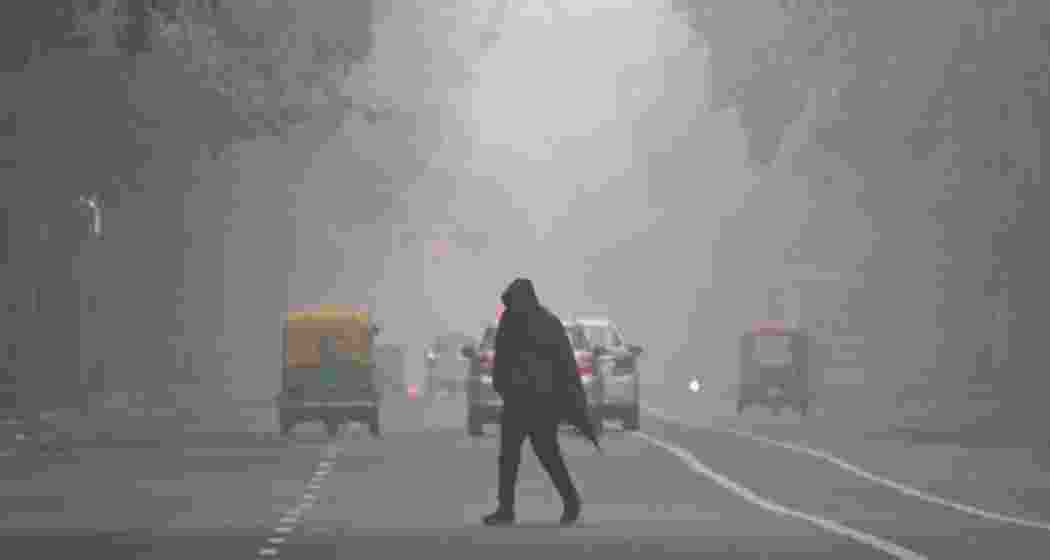 A person wraps himself in layers to brave the biting cold in New Delhi after the capital recorded its lowest temperature of the season at 5.8 degrees Celsius. A person wraps himself in layers to brave the biting cold in New Delhi after the capital recorded its lowest temperature of the season at 5.8 degrees Celsius.