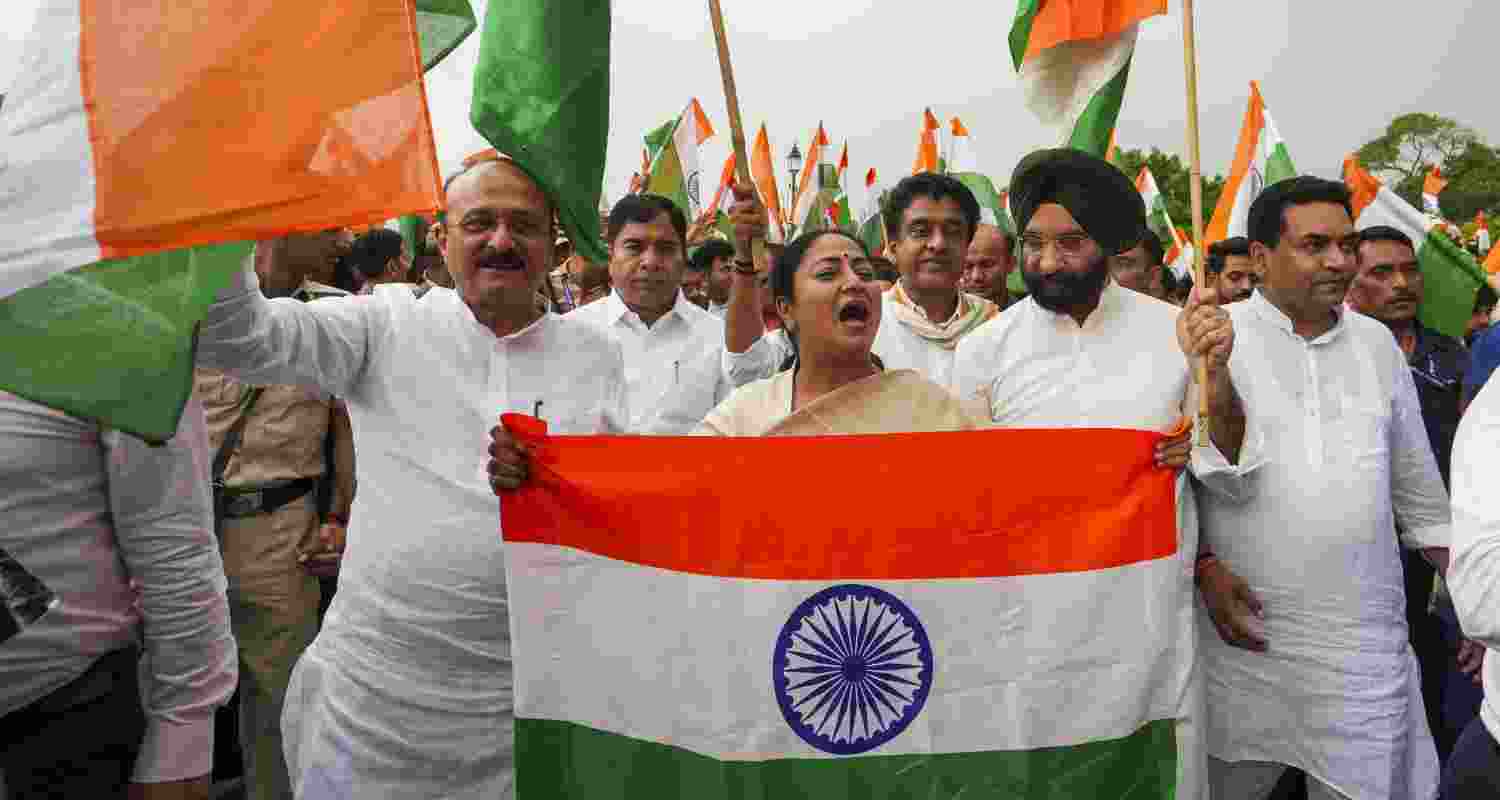 Delhi Chief Minister Rekha Gupta with ministers Ashish Sood, Manjinder Singh Sirsa, and Kapil Mishra takes part in the 'Tiranga Yatra' from Kartavya Path to the National War Memorial to express solidarity with the Indian armed forces, in New Delhi, Tuesday. Delhi Chief Minister Rekha Gupta with ministers Ashish Sood, Manjinder Singh Sirsa, and Kapil Mishra takes part in the 'Tiranga Yatra' from Kartavya Path to the National War Memorial to express solidarity with the Indian armed forces, in New Delhi, Tuesday.
