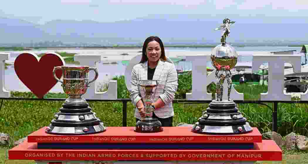 Indian weightlifter from Manipur, Mirabai Chanu, with the Durand Cup trophies in Imphal during the trophy tour. Indian weightlifter from Manipur, Mirabai Chanu, with the Durand Cup trophies in Imphal during the trophy tour.