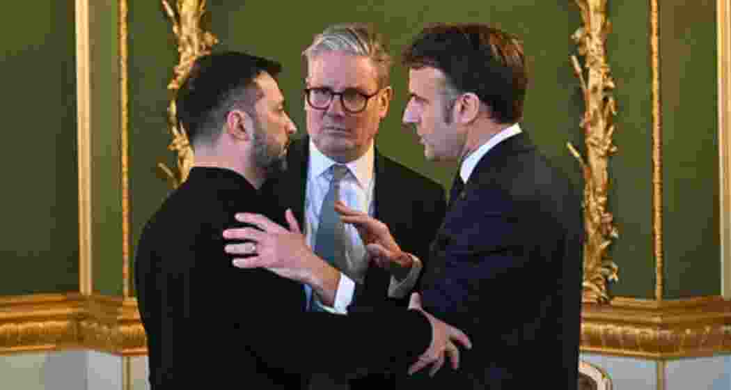 (L to R) Volodymyr Zelensky, Keir Starmer and Emmanuel Macron talk during the defence summit. (L to R) Volodymyr Zelensky, Keir Starmer and Emmanuel Macron talk during the defence summit.