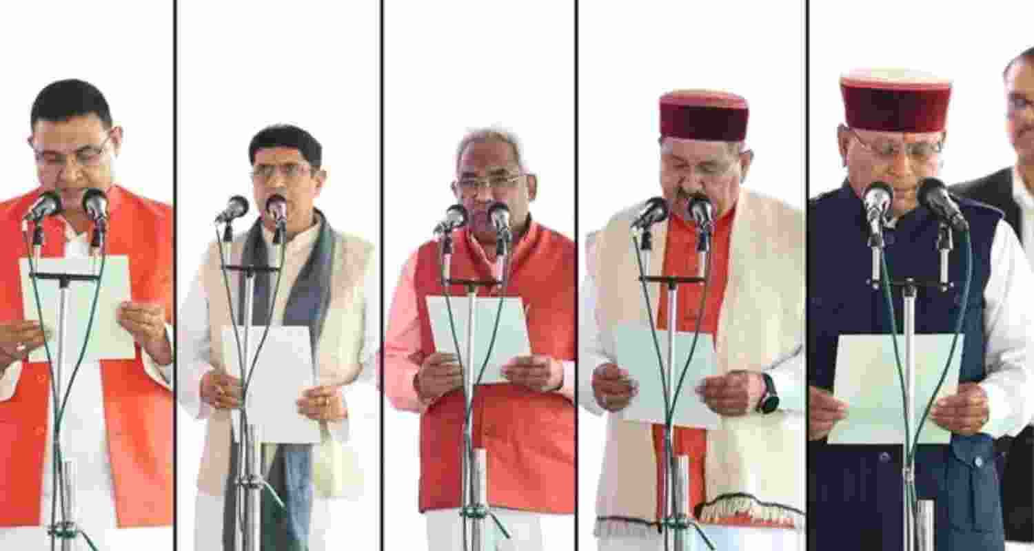 Five MLAs take oath as ministers during Uttarakhand cabinet expansion in Dehradun on Friday. Five MLAs take oath as ministers during Uttarakhand cabinet expansion in Dehradun on Friday.