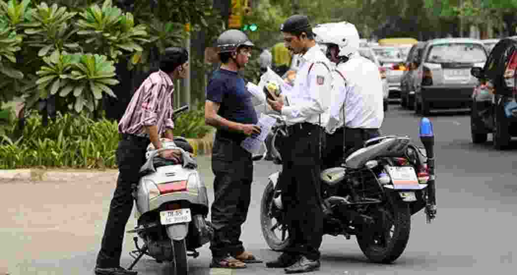 Two helmets may soon become standard with all new two-wheelers as part of the Centre’s draft rule aimed at improving road safety and protecting both riders and pillion passengers. Representative image. Two helmets may soon become standard with all new two-wheelers as part of the Centre’s draft rule aimed at improving road safety and protecting both riders and pillion passengers. Representative image.