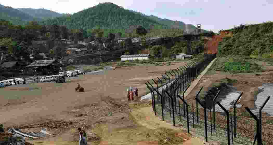 A section of the fenced Indo-Myanmar border in Manipur. A section of the fenced Indo-Myanmar border in Manipur.
