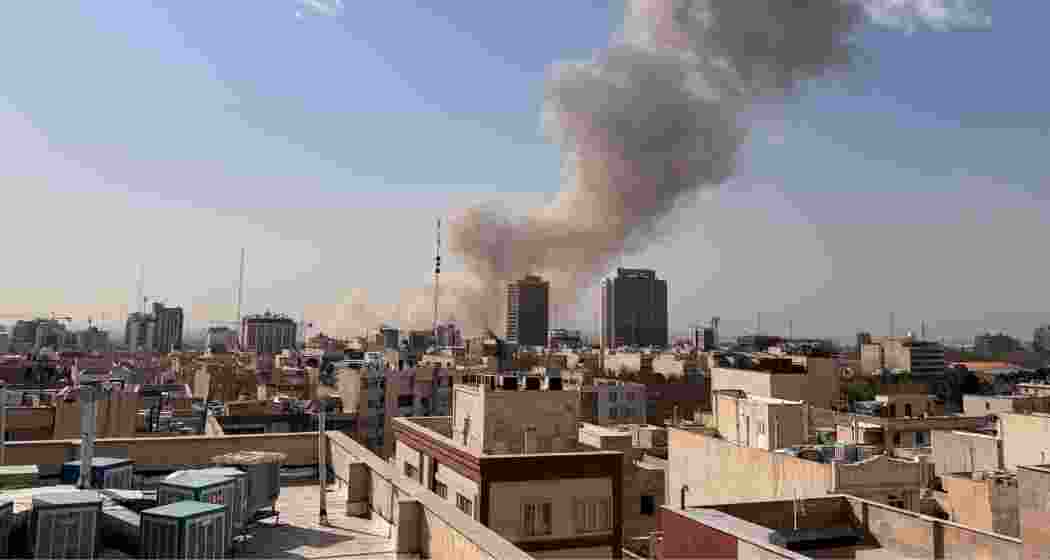 Smoke rises on the skyline after an explosion in Tehran, Iran on Saturday. Smoke rises on the skyline after an explosion in Tehran, Iran on Saturday.
