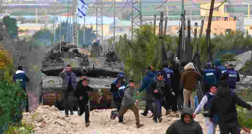 Civilians flee as Israeli tanks roll into the occupied West Bank for the first time in decades, amid escalating tensions and military operations in Palestinian refugee camps. Civilians flee as Israeli tanks roll into the occupied West Bank for the first time in decades, amid escalating tensions and military operations in Palestinian refugee camps.